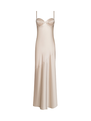 The Sayla Silk Gown by L'AGENCE is a sleeveless, champagne-hued satin slip dress with thin spaghetti straps, subtle bust detailing, and a gently flared ankle-length skirt for timeless, minimalist elegance.