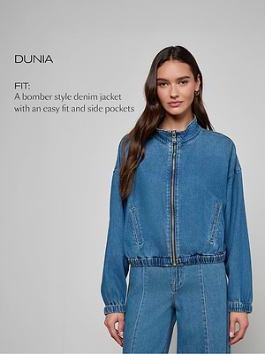 Woman wearing a blue denim bomber jacket with text describing the product on a gray background
