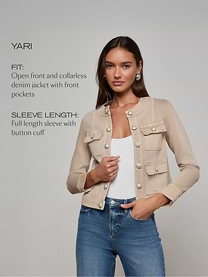 Woman wearing a beige denim jacket with text describing the fit and sleeve length on a gray background