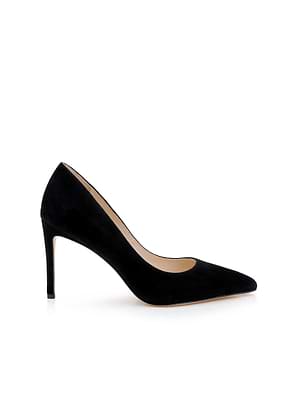 The Maelle Suede Pump by L'AGENCE features black suede, a pointed toe, and a slender stiletto heel, elegantly shown in profile against a white background.