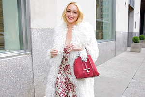 Lindsay Lohan Kicks Off New York Fashion Week in a Floral Slip and Fluffy Shaggy Coat